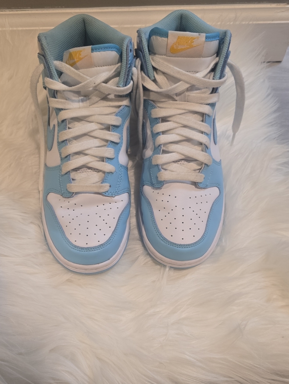 Nike High-Top Sneakers in White and Light Blue with Yellow Logo
